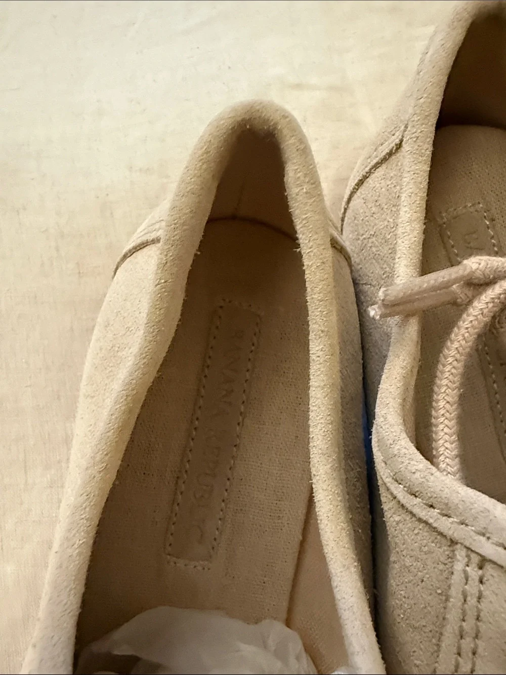 Beige Suede Lace-Up loafers.